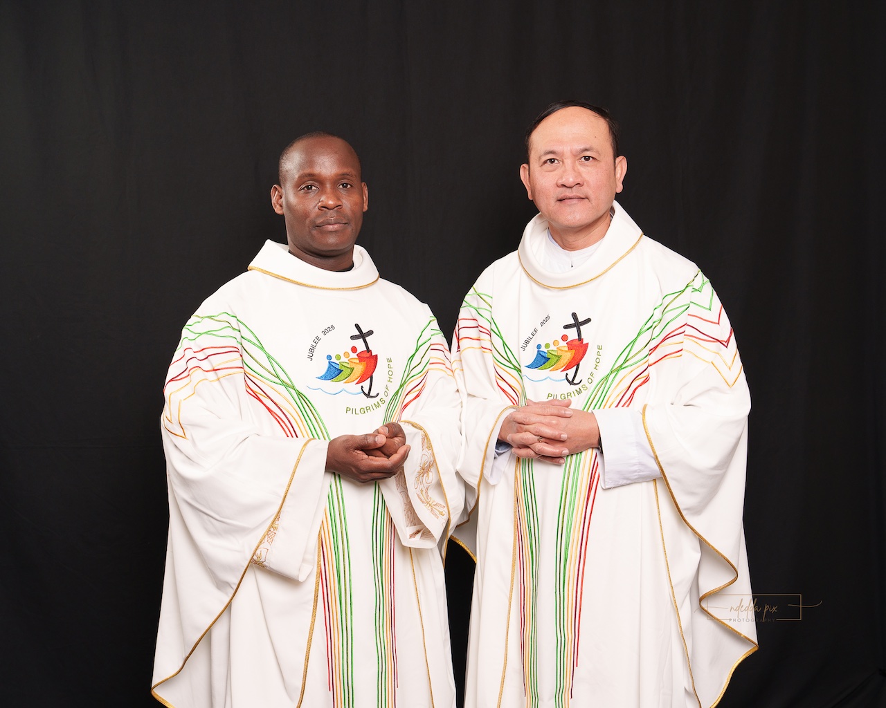 Portrait Photo of Fr. Cyp and Fr. Tri